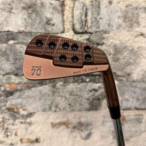 Close-up of the Sub70 649 TR MB golf wedge showing the clubhead with detailed design and branding.